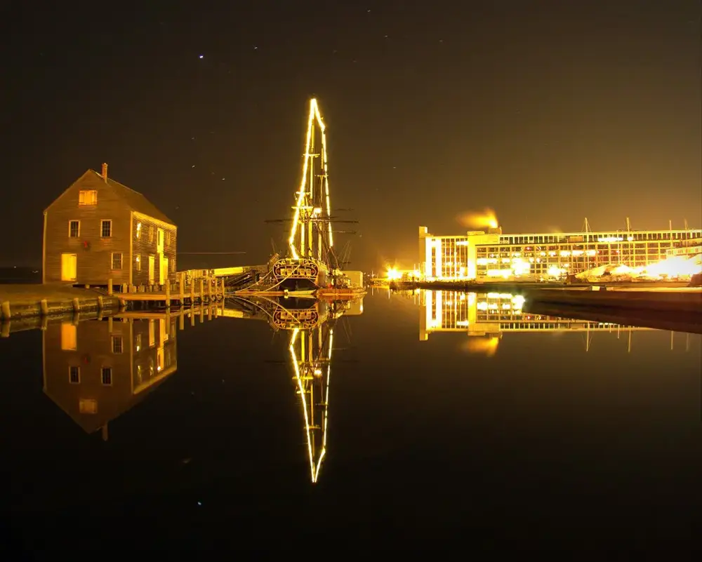 The Friendship of Salem, Reflections on Derby Wharf - Salem, Massachusetts.