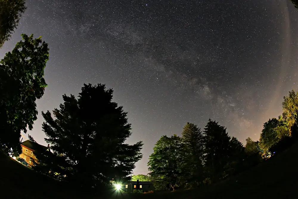 a fisheye lens slow exposure photograph of the Milkyway, Kennebunk Maine.