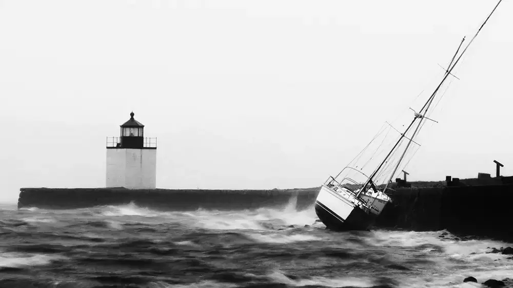 A sailboat being slammed into the harbor wall during Hurricane Sandy, Salem Massachusetts.