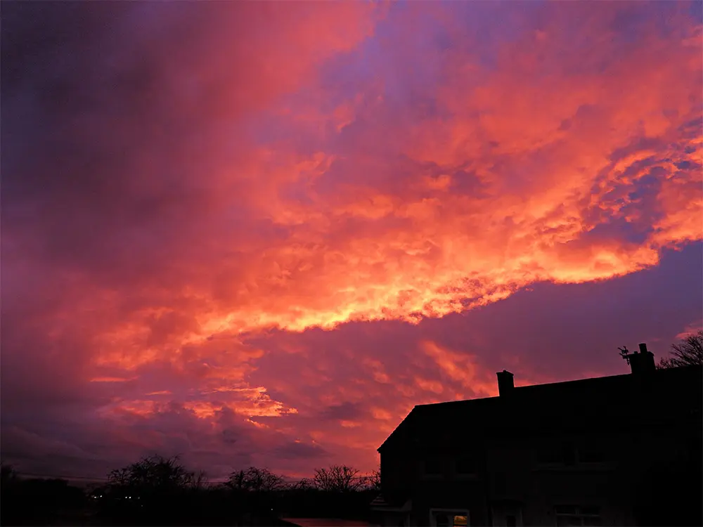 A bright red sunset over Bargeddie, Scotland.