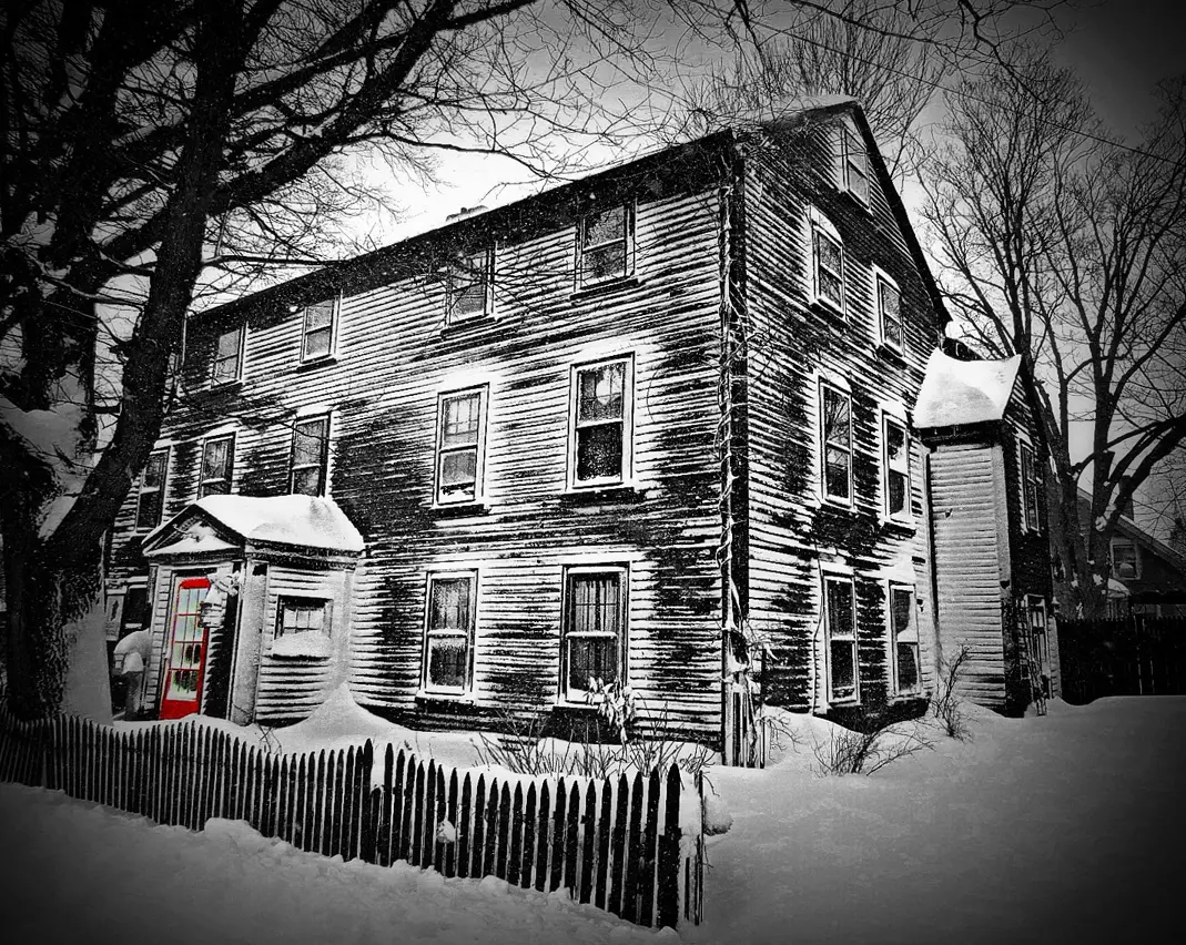A historic house in Salem Massachusetts in snow.